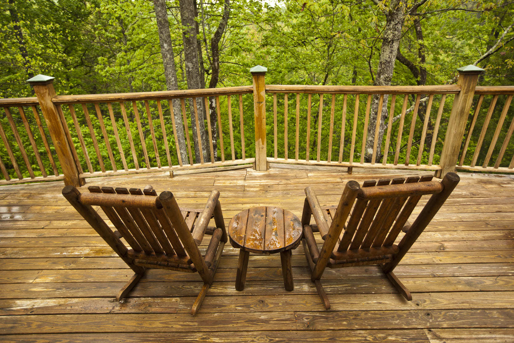 Deck overlooking greenery typical of cabins in Sky Harbor, Tennessee